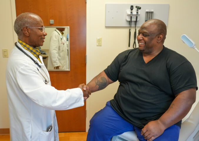 Doctor shakes patient's hand